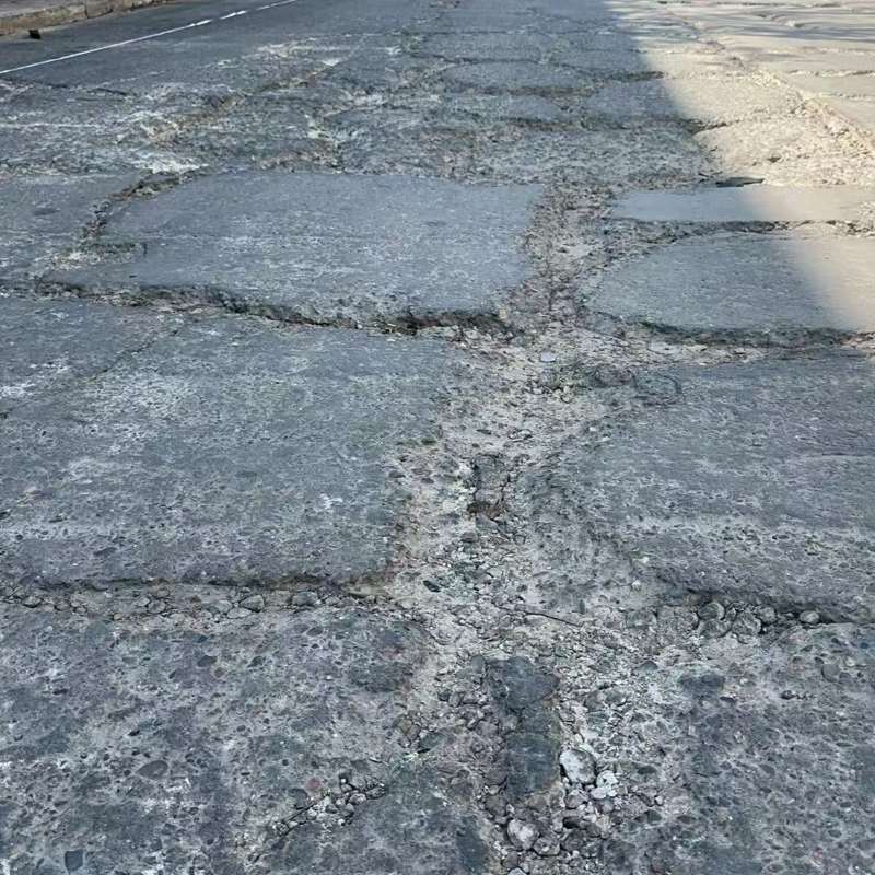 绥江路面起砂露石子修补料